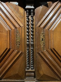 An imposing baroque-style parquetry oak four-door cupboard, 19th C.