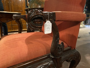 A richly decorated English Georgian style mahogany Gainsborough chair, ca. 1900