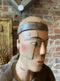 A polychrome wooden sculpture of a monk, 17/18th C.