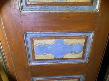 A pair of large Italian polychrome wooden two-door cupboards with coats of arms, 17th C.