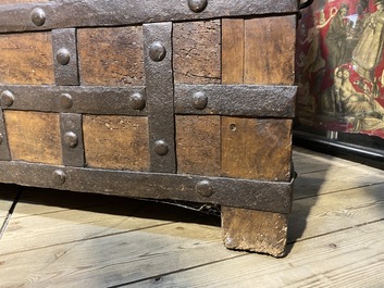 A wrought iron-mounted wooden coffer, 17th C.