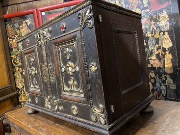 An ebonised and inlaid wooden cabinet, 19th C.