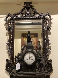 An ebonised walnut rococo-style mirror, probably Italy, 18/19th C.