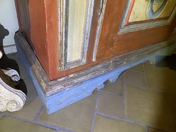 A pair of large Italian polychrome wooden two-door cupboards with coats of arms, 17th C.