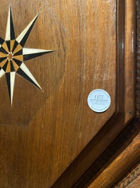 An imposing baroque-style parquetry oak four-door cupboard, 19th C.