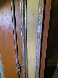 A pair of large Italian polychrome wooden two-door cupboards with coats of arms, 17th C.