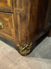 A French mahogany veneered gilt bronze mounted chest of drawers with marble top, 18th C.