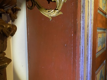 A pair of large Italian polychrome wooden two-door cupboards with coats of arms, 17th C.