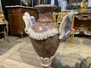 A pair of imposing marble 'eagles' vases, 20th C.