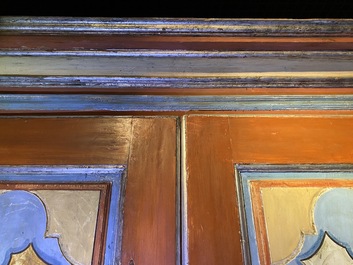 A pair of large Italian polychrome wooden two-door cupboards with coats of arms, 17th C.