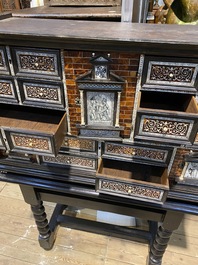 A Spanish partly ebonised wooden cabinet with tortoiseshell veneer and engraved bone plaques, 19th C.