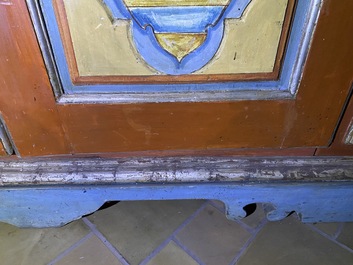 A pair of large Italian polychrome wooden two-door cupboards with coats of arms, 17th C.