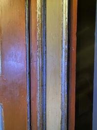 A pair of large Italian polychrome wooden two-door cupboards with coats of arms, 17th C.