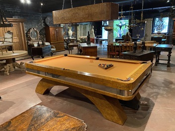 A burl wood veneered billiard table with accompanying lighting and cue holder, 20th C.