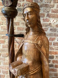 A large oak figure of Saint Catherine of Alexandria, early 16th C.
