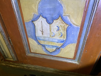 A pair of large Italian polychrome wooden two-door cupboards with coats of arms, 17th C.