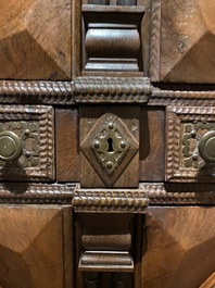 An imposing baroque-style parquetry oak four-door cupboard, 19th C.