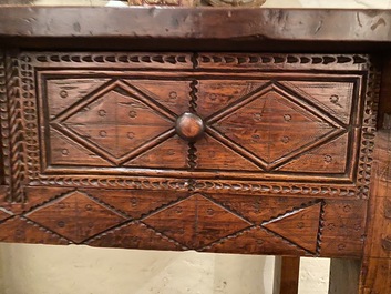 A Spanish walnut table with two drawers, 17th C.