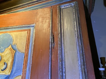 A pair of large Italian polychrome wooden two-door cupboards with coats of arms, 17th C.