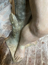 Een polychrome stenen figuur van Sint-Sebastiaan, 17e eeuw