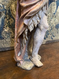 A large polychrome oak figure of John the Baptist, early 17th C.