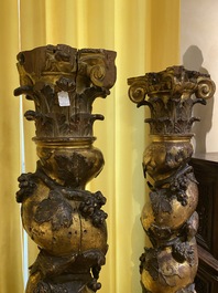 A pair of twisted and partly gilt wooden columns with birds and grapevines, prob. Italy, 17/18th C.