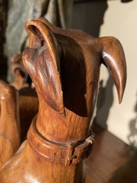 A pair of English wooden greyhounds with a shield, 19th C.