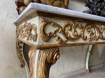 A pair of Italian patinated and gilt wooden wall consoles with marble top, 18th C.