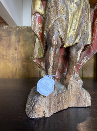 A polychromed and gilt walnut sculpture of John the Baptist holding the lamb, mid 16th C.