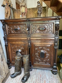 A Flemish ebonised and oak wooden four-door cabinet, 17th C.