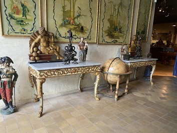 A pair of Italian patinated and gilt wooden wall consoles with marble top, 18th C.