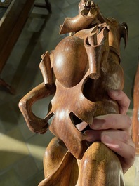 A pair of English wooden greyhounds with a shield, 19th C.