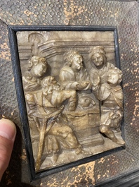 An alabaster relief depicting 'The breaking of the bread', Malines, 17th C.