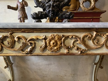 A pair of Italian patinated and gilt wooden wall consoles with marble top, 18th C.