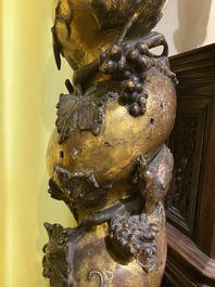 A pair of twisted and partly gilt wooden columns with birds and grapevines, prob. Italy, 17/18th C.