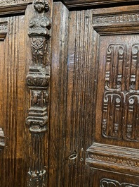 A rare German carved oak sculptural cupboard on diagonal supports with recumbent lions, Westphalia, 16th C.