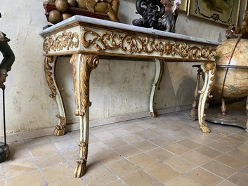 A pair of Italian patinated and gilt wooden wall consoles with marble top, 18th C.