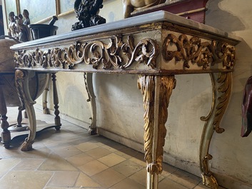 A pair of Italian patinated and gilt wooden wall consoles with marble top, 18th C.