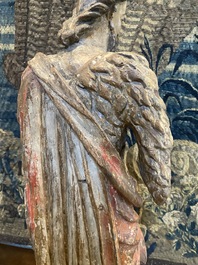 Een grote polychrome eikenhouten figuur van Johannes de Doper, vroeg 17e eeuw