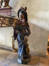 Een paar polychrome terracotta figuren van een man en vrouw, 18/19e eeuw