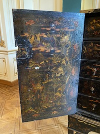 An English lacquered and painted chinoiserie cabinet on stand, 19th C.