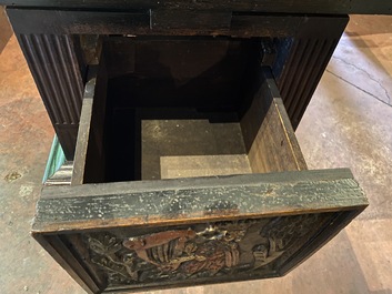 A rare ebonised wooden baluster leg table with polychromed reliefs, 17th C. with later elements