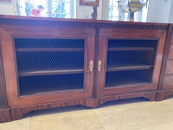 An English neoclassical leather-topped mahogany library desk with gilt bronze mounts, 19th C.