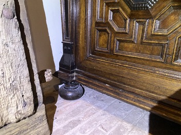 A Flemish ebonised and oak wooden four-door cabinet, 17th C.