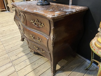 A French Louis XV-style bronze mounted chest of drawers with marble top, 19th C.