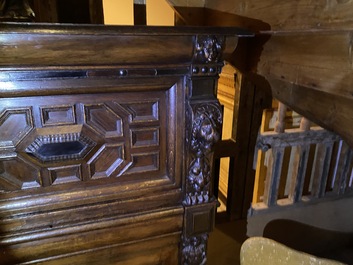 A Flemish ebonised and oak wooden four-door cabinet, 17th C.