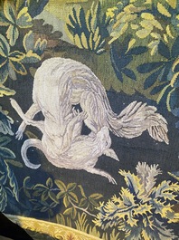 A French Aubusson wall tapestry with a wolf battling a fox in a forest setting with castle view, 19th C.