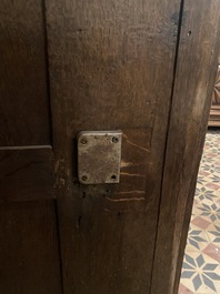 A rare German carved oak sculptural cupboard on diagonal supports with recumbent lions, Westphalia, 16th C.