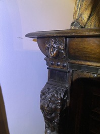 A Flemish ebonised and oak wooden four-door cabinet, 17th C.