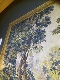 A French Aubusson wall tapestry with a wolf battling a fox in a forest setting with castle view, 19th C.